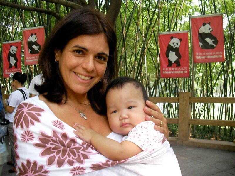 The author with her newly adopted daughter at the Chongqing Zoo in China. (Courtesy Grazie Christie)