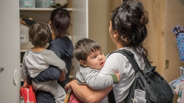 Mothers pick up supplies from Claris Health's "baby store." Claris offers services for pregnant women and families with young children in the LA area and is one of the Archdiocese of Los Angeles' community partners. (Claris Health)