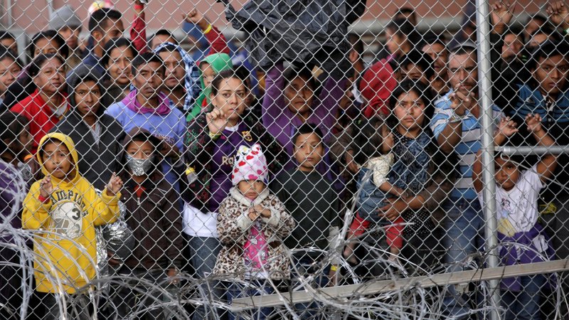 Central American migrants are seen inside an enclosure in El Paso, Texas, March 27, 2019. They were being held by U.S. Customs and Border Protection officers after crossing the U.S.-Mexico border and turning themselves in to request asylum. Under Trump administration policy, the migrants must be returned to Mexico and apply for U.S. asylum from there. (CNS photo/Jose Luis Gonzalez, Reuters)