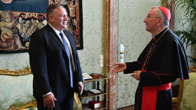 U.S. Secretary of State Mike Pompeo talks with Cardinal Pietro Parolin, Vatican secretary of state, during a meeting at the Vatican Oct. 1, 2020. (CNS photo/Vatican Media)