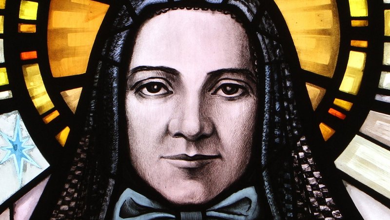St. Frances Xavier Cabrini, patron of immigrants, is depicted in a stained-glass window at the saint's shrine chapel in New York City. Colorado celebrates its first Cabrini Day Oct. 5, 2020. (CNS photo/Gregory A. Shemitz)