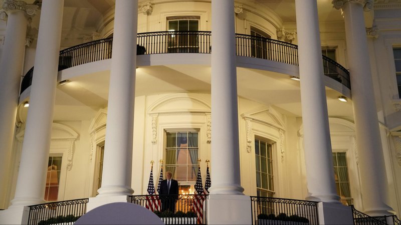 President Donald Trump poses atop the Truman Balcony of the White House in Washington Oct. 5, 2020. He was hospitalized Oct. 2 at Walter Reed National Military Medical Center in Bethesda, Md., after testing positive for the coronavirus disease. (CNS photo/Erin Scott, Reuters)