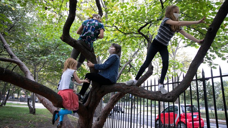 Children in the Brooklyn borough of New York City play after their first day of in-person school Oct. 1, 2020. (CNS photo/Caitlin Ochs, Reuters)