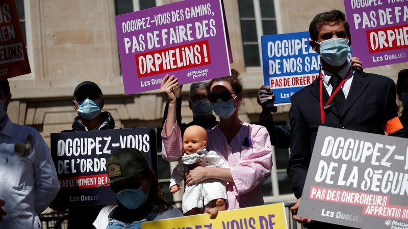 Members of "Protest for All" attend a 2019 demonstration against medically assisted procreation and surrogate motherhood in response to bioethics legislation at the National Assembly in Paris. (CNS photo/Benoit Tessier, Reuters)