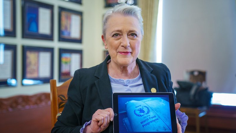 Berit Reiss-Andersen, chair of the Nobel Committee, shows a displayed image with the logo of the World Food Program in Oslo, Norway, Oct. 9, 2020. WFP, which partners with both governments and nongovernmental organizations, including Caritas Internationalis and national Catholic charities around the world, was awarded the 2020 Nobel Peace Price. (CNS photo/Stian Lysberg Solum, NTB via Reuters)