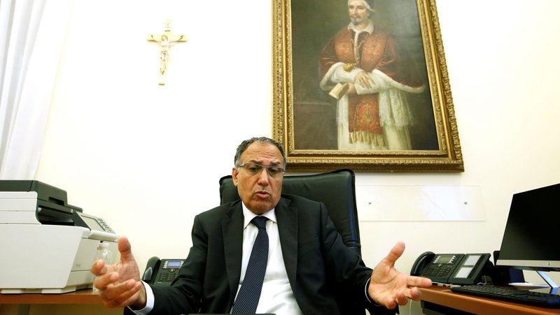 Carmelo Barbagallo, president of the Vatican's Financial Information Authority, gestures during an interview at the Vatican in this July 2, 2020, file photo. The Vatican has amended its transparency laws and expanded the role of its Financial Information Authority in monitoring financial transactions. (CNS photo/Remo Casilli, Reuters)