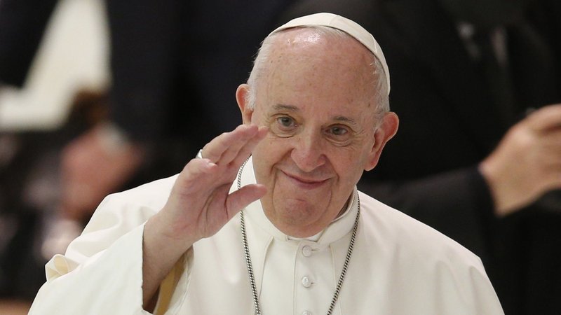Pope Francis greets the crowd during his general audience in Paul VI hall at the Vatican Oct. 14, 2020. A few days after four Swiss Guards tested positive for COVID-19, the pope broke from his normal pattern and did not personally greet people in the crowd. (CNS photo/Paul Haring)