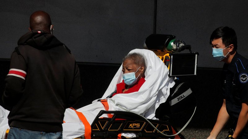 A patient in the Brooklyn borough of New York City arrives at the Emergency entrance to Maimonides Medical Center Oct. 14, 2020, during the coronavirus pandemic. (CNS photo/Brendan McDermid, Reuters)