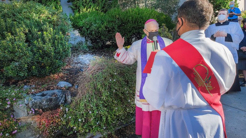 San Francisco Archbishop Salvatore J. Cordileone conducts an exorcism at Mission San Rafael in California Oct. 17, 2020. Vandals tore down a St. Junipero Serra statue there Oct. 12. (CNS photo/Dennis Callahan, Archdiocese of San Francisco)