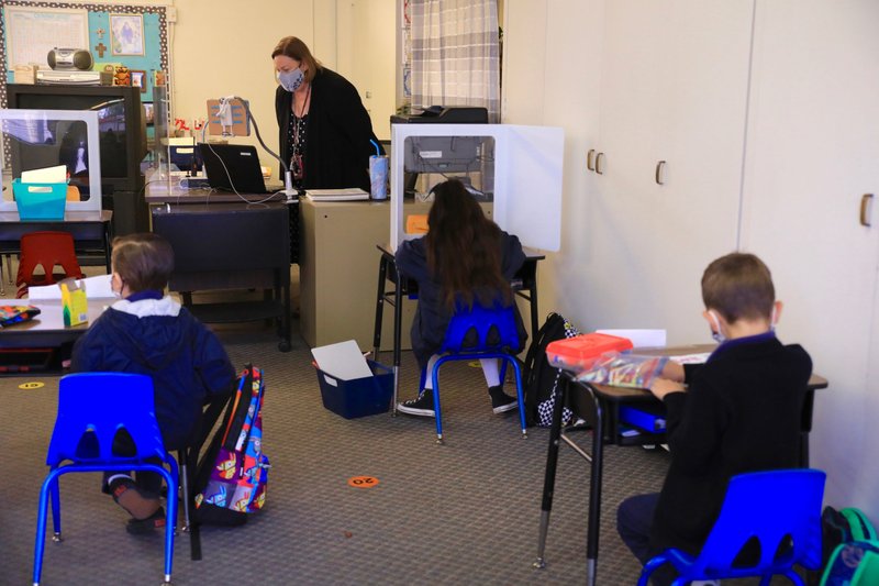 Students in the classroom on the first day of in-person instruction for grades TK-2nd at St. Maria Goretti School in Long Beach. (David Amador Rivera/Angelus)