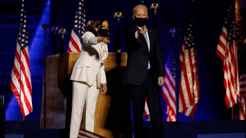 Democratic presidential nominee Joe Biden joins vice presidential nominee Kamala Harris onstage at a rally in Wilmington, Del., Nov. 7, 2020, after news media declared they had won the presidential election.(CNS photo/Jim Bourg, Reuters)