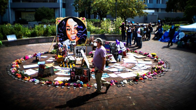 People in Louisville, Ky., gather near a memorial for Breonna Taylor Sept. 25, 2020. (CNS photo/Eduardo Munoz, Reuters)