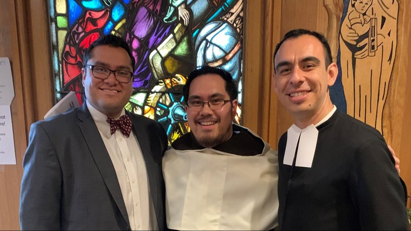 Cathedral High School alumni Brother Chris Patiño (right) with Brother Ryan Resurrecion (center) at Resurrecion's first vows as Carmelite brother in 2019.