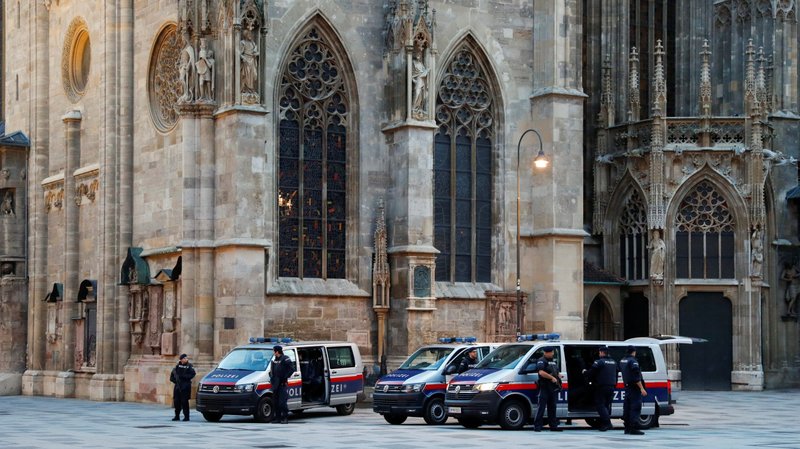 Police officers stand guard outside St. Stephan's Cathedral in Vienna Nov. 3, 2020, following a deadly shooting spree in the city the previous day. (CNS photo/Leonhard Foeger, Reuters)