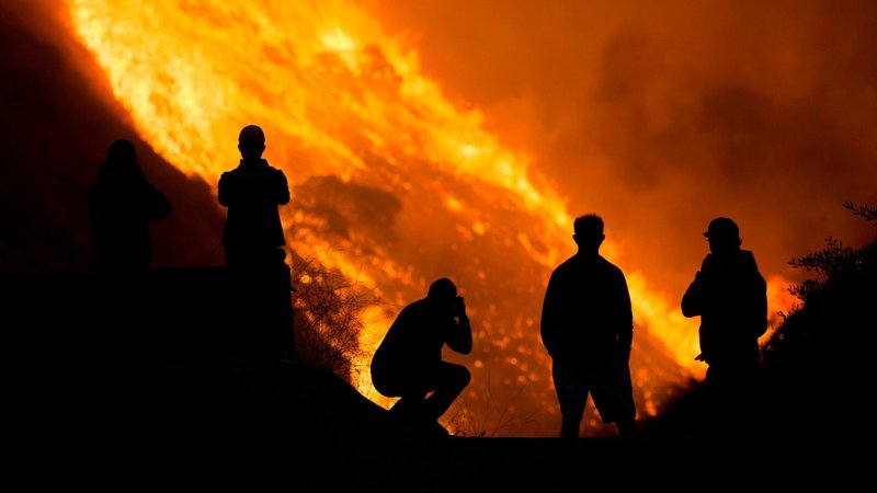 People in Yorba Linda, Calif., are seen near the Blue Ridge Fire Oct. 26, 2020. (CNS photo/Ringo Chiu, Reuters)