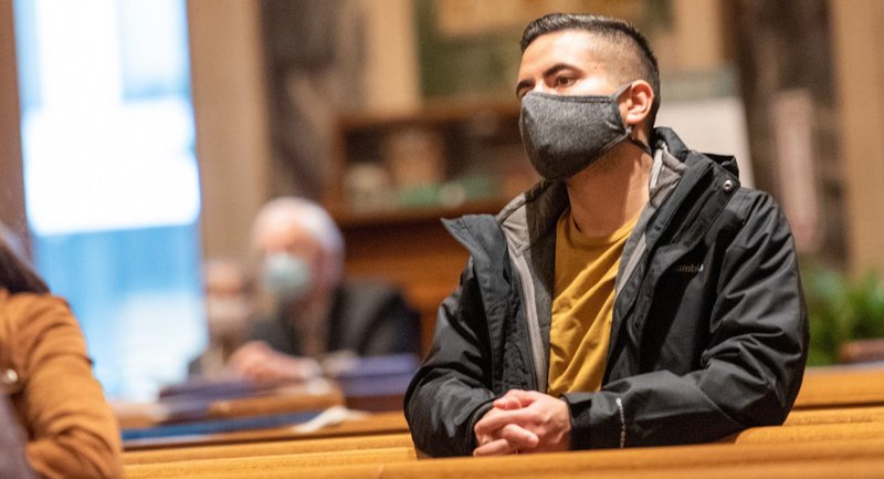 A man prays during an All Saints Day Mass at the Cathedral of St. Matthew the Apostle in Washington Nov. 1, 2020. (CNS photo/Mihoko Owada, Catholic Standard)