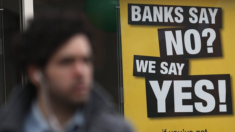 A posted about payday lending is seen in this illustration photo. (CNS photo/Suzanne Plunkett, Reuters)