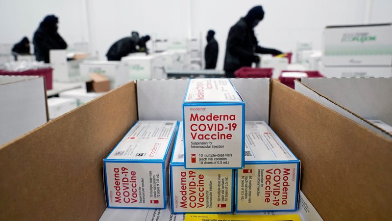 Doses of the Moderna COVID-19 vaccine are seen in boxes as preparations are made to distribute them in Olive Branch, Miss., Dec. 20, 2020. (CNS photo/Paul Sancya, Pool via Reuters)