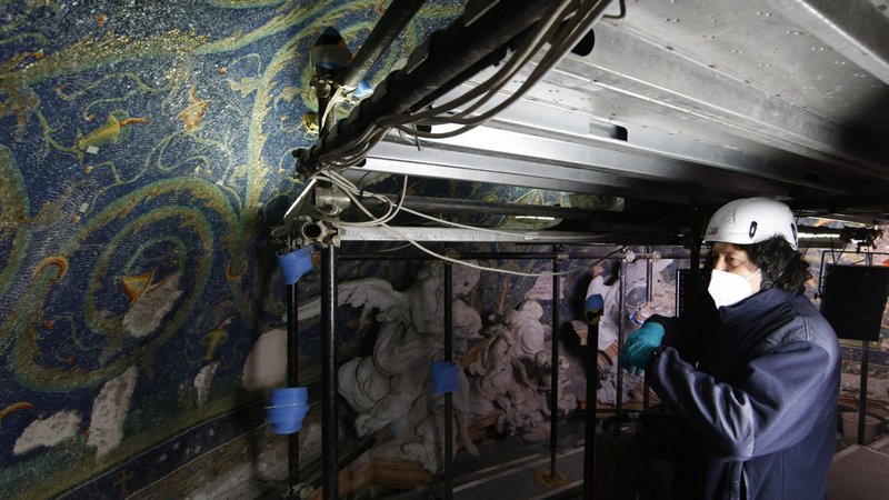 Daniele Belladonna works on the restoration of mosaics from the 5th century in the historic vestibule of the baptistery at the Basilica of St. John Lateran in Rome Dec. 9, 2020. Vatican restorers are tackling one of the oldest mosaics in Christianity, dated to around 450 AD. (CNS photo/Paul Haring)