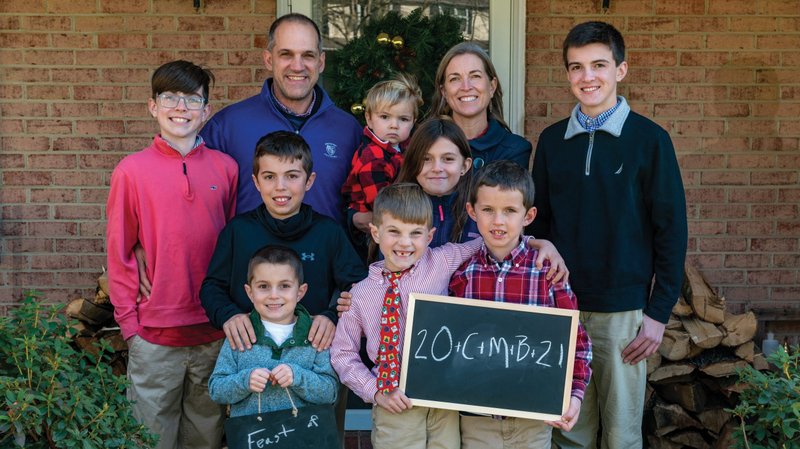 Will and Amy Buttarazzi, parishioners at St. Joseph Church in Cockeysville, Md., pose for a photo with their children Dec. 6, 2020. As part of their Christmas tradition they will bless their home for the year ahead with holy oil, frankincense and myrrh on the Feast of the Epiphany. (CNS photo/Kevin J. Parks, Catholic Review)