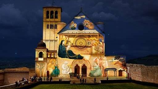Giotto’s Nativity is projected on the facade of the Basilica of St. Francis of Assisi. (Diocese of Assisi-Nocera Umbra-Gualdo Tadino via CNA)