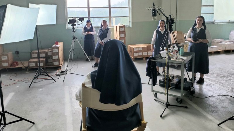 Daughters of St. Paul during the filming of a promotional video for The Daughters’ Project in their Boston warehouse. (Daughters of St. Paul)