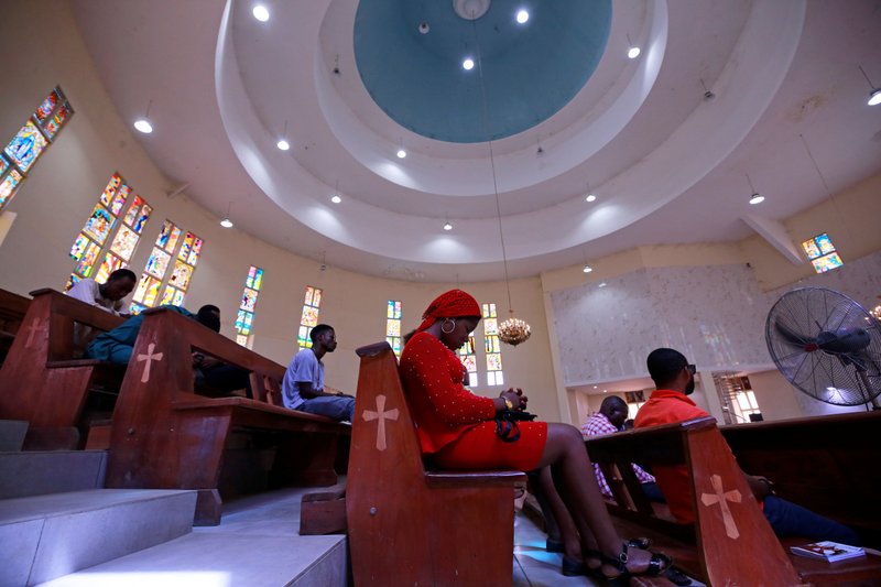 Worshipers pray during a March 22, 2020, Mass at St. Gabriel Church in Abuja, Nigeria. (Catholic News Service/Afolabi Sotunde, Reuters)