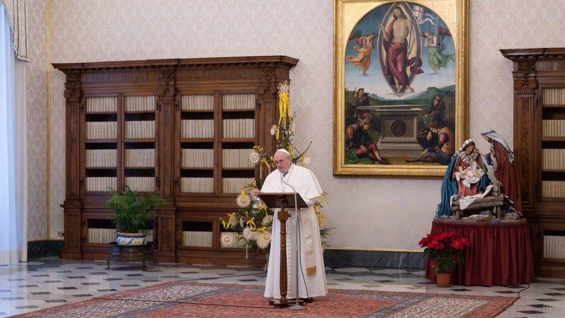 Pope Francis leads the Angelus prayer from the library of the Apostolic Palace at the Vatican Jan. 10, 2021. Always celebrate the date of one's baptism, which reflects God's never-ending love, the pope said. (CNS photo/Vatican Media)