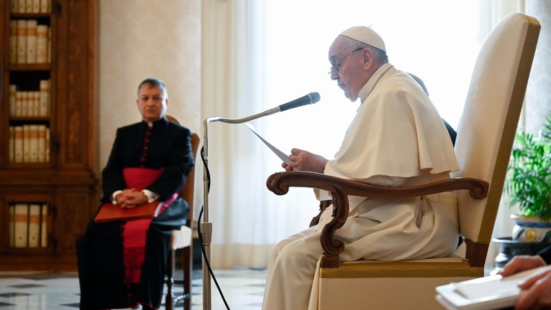 Pope Francis leads his weekly general audience from the library of the Apostolic Palace at the Vatican Jan 13, 2021. In his main talk, the pope focused on the importance of praising God in times of darkness and difficulty. (CNS photo/Vatican Media)