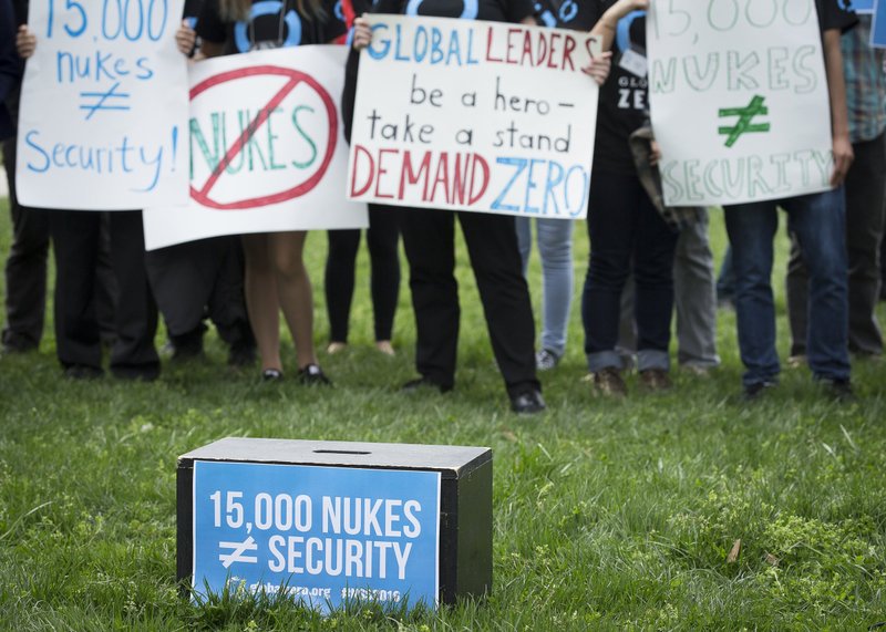 Demonstrators in Washington protest nuclear weapons April 1, 2016, as world leaders met in the U.S. capital for the Nuclear Security Summit. A Holy See-supported treaty banning the possession of nuclear weapons that comes into force Jan. 22, 2021, is buoying efforts of nations and organizations working to abolish such armaments. (CNS photo/Tyler Orsburn)