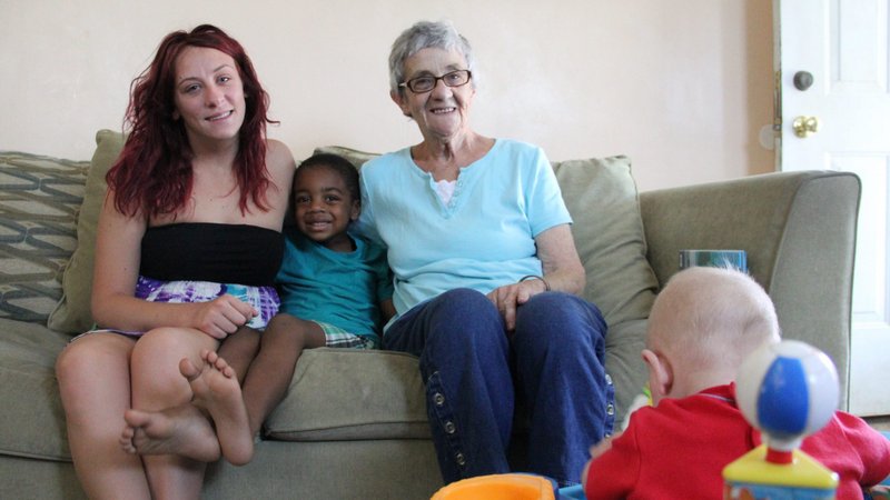 Cecilia Paul, right, a foster mother through Catholic Social Services of the Philadelphia Archdiocese for more than 40 years, is pictured in her Philadelphia home in this 2015 file photo with daughter Taylor and son Jamil, both of whom she cared for as a foster mother before adopting them. A Department of Health and Human Services modified rule taking effect Jan. 19, 2021, helps ensure faith-based social service providers will not be excluded from certain federally funded programs. (CNS photo/Sarah Webb, CatholicPhilly.com)