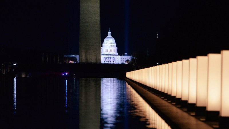 The U.S. Capitol is seen reflected at the reflecting pool at the Lincoln Memorial in Washington Jan. 19, 2021, after President-elect Joe Biden hosted a memorial honoring those who died from the coronavirus disease. (CNS photo/Callaghan O'Hare, Reuters)