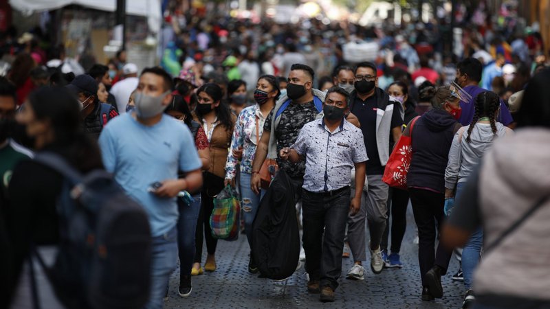 Shoppers, the vast majority wearing protective face masks, crowd a street in a commercial district of central Mexico City, Saturday, Dec. 5, 2020. (Rebecca Blackwell/AP via Crux)