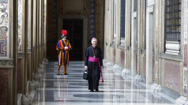 Then-Archbishop Luis Ladaria Ferrer, prefect of the Congregation for the Doctrine of the Faith, arrives for a meeting with Pope Francis in the Apostolic Palace at the Vatican in this May 11, 2018, file photo. Cardinal Ladaria said the Congregation for the Doctrine of the Faith is no longer "the Inquisition," but rather its main focus is handing down the teachings of the apostles. (CNS photo/Paul Haring)