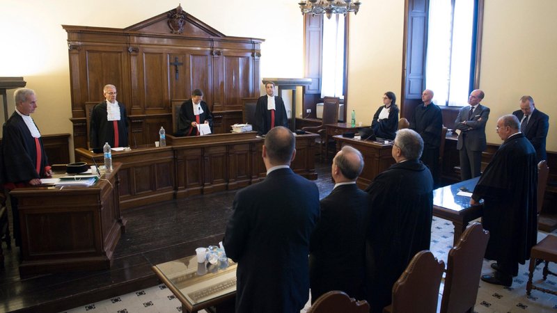 Giuseppe Profiti, former president of Bambino Gesu hospital in Rome, and Massimo Spina, former treasurer of the hospital, are pictured at right during their sentencing at the Vatican court in this Oct. 14, 2017, file photo. Pope Francis has approved a number of changes to Vatican City State's penal code and criminal justice proceedings, including the possibilities of reduced sentences, rehabilitation programs and community service sentencing, as well as no longer allowing trials "in absentia." (CNS photo/L'Osservatore Romano)