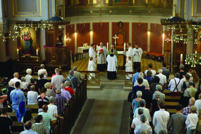 Mass at Sankt Ansgars Kirke Cathedral in the Catholic Diocese of Copenhagen, which includes all of Denmark. (Image via Facebook)