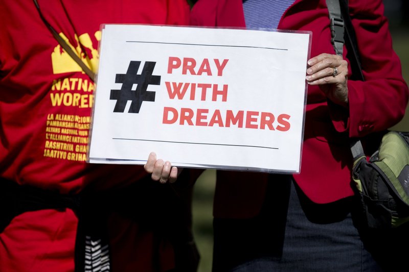 Demonstrators attend a rally near the U.S. Capitol in Washington Sept. 26, 2017, calling for passage DREAM Act. The Development, Relief and Education for Alien Minors Act, which would provide a pathway to U.S. citizenship for unauthorized immigrant youth, has never passed Congress. It was reintroduced in the Senate and House Feb. 2, 2021, and March 3, 2021, respectively. (CNS photo/Tyler Orsburn)