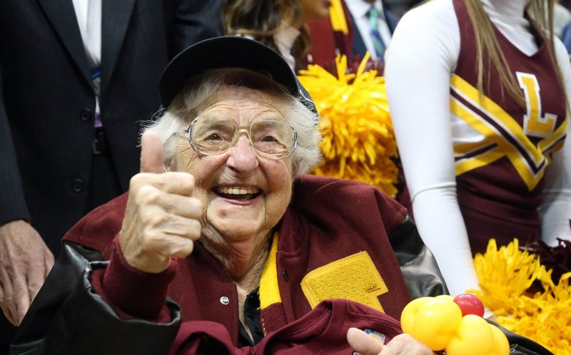 Sister Jean Dolores Schmidt, longtime chaplain of the Loyola University Chicago men's basketball team and campus icon, gives a thumbs up after the team defeated the Nevada Wolf Pack in the semifinals of the South regional of the 2018 NCAA Tournament March in Atlanta. (CNS photo/Brett Davis-USA TODAY Sports via Reuters)