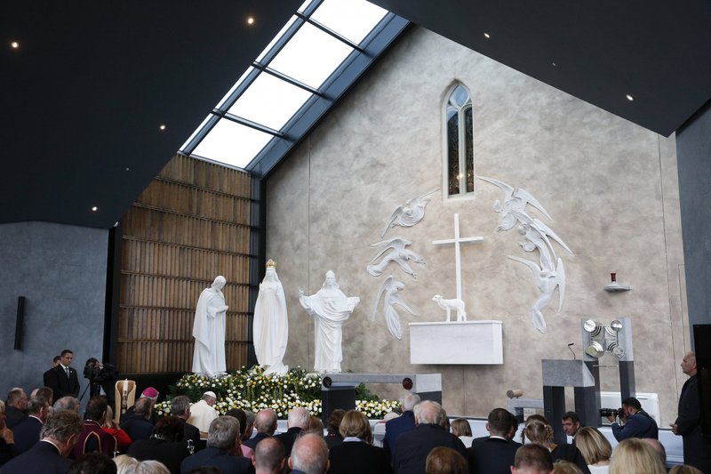Pope Francis is pictured in an Aug. 26, 2018, photo praying as he visits the Chapel of the Apparitions at Ireland's Knock Shrine. Pope Francis delivered a special virtual message recognizing the shrine as an International Marian and Eucharistic Shrine during Mass March 19, 2021. (CNS photo/Paul Haring)
