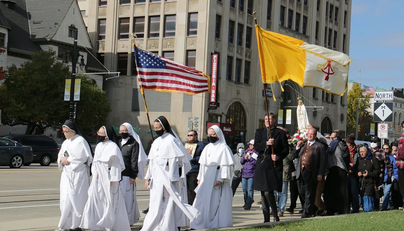 Women religious and other Catholics in Detroit march during a Unite Our Nation procession on Oct. 31, 2020. The procession was part of a nationwide campaign to take Christ to the streets before the presidential election. (CNS /Dan Meloy, Detroit Catholic)