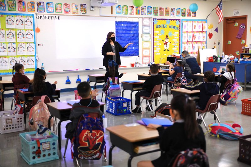 St. Bernard kindergartners in the classroom on March 3, 2021 their first day of in-person learning after the pandemic. (David Amador Rivera)