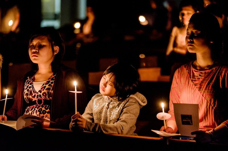 Young people hold candles during the Easter Vigil in 2015 at the Cathedral of St. Joseph in Hartford, Conn. (CNS photo/Bob Mullen)