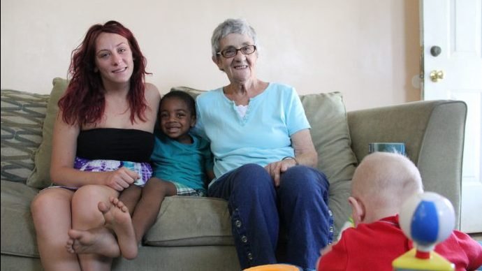 Cecilia Paul, right, a foster mother through Catholic Social Services of the Philadelphia Archdiocese for more than 40 years, is pictured in her Philadelphia home in this 2015 file photo with daughter Taylor and son Jamil, both of whom she cared for as a foster mother before adopting them. A Department of Health and Human Services modified rule taking effect Jan. 19, 2021, helps ensure faith-based social service providers will not be excluded from certain federally funded programs. (Sarah Webb, CatholicPhilly.com, via CNS).