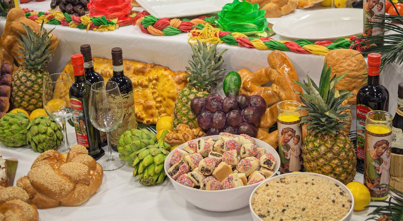 Food and wine displayed on St. Joseph's altar to celebrate St. Joseph's Day. (William A. Morgan/Shutterstock)