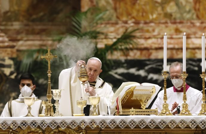 Pope Francis celebrates the Easter Vigil in a nearly empty St. Peter's Basilica as coronavirus pandemic restrictions stay in place for a second year running, at the Vatican, Saturday, April 3, 2021. (Remo Casilli/Pool photo via AP/Crux)