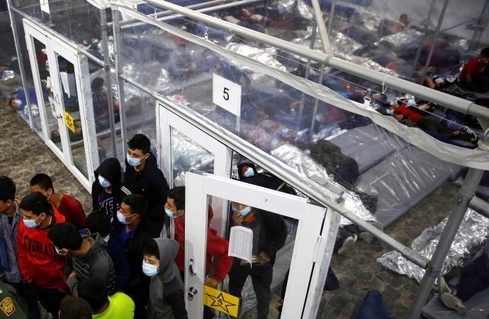 Young migrants are seen March 30, 2021, at the holding facility in Donna, Texas, set up in February by U.S. Customs and Border Protection, an agency within the Department of Homeland Security. (Dario Lopez-Mills, Pool via Reuters/Crux)