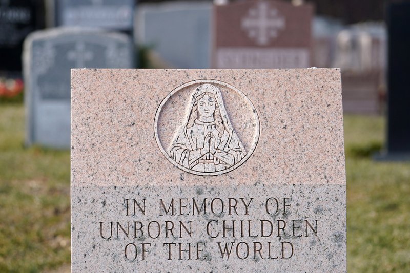 A memorial stone dedicated to the unborn children of the world is seen at St. Patrick Parish Cemetery in Smithtown N.Y., Jan. 22, 2021. The National Prayer Luncheon for Life will be held in-person in Grapevine, Texas,and livestreamed to many more particpants April 30. (CNS photo/Gregory A. Shemitz)