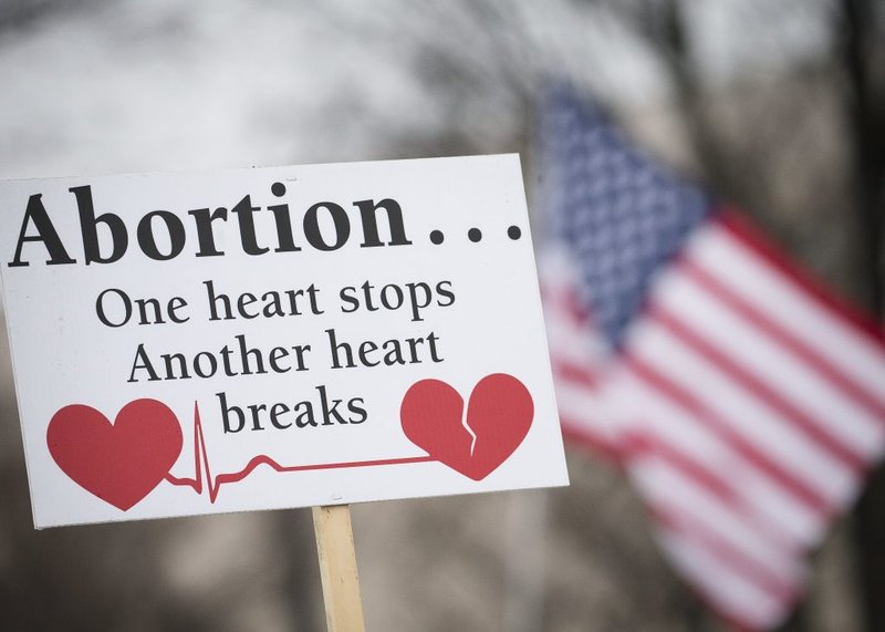 A pro-life sign is displayed during the 2019 annual March for Life rally in Washington. In Idaho, the Legislature approved a measure April 20, 2021, to ban abortion once a fetal heartbeat is detected and it was sent to Gov. Brad Little. (Tyler Orsburn/CNS)