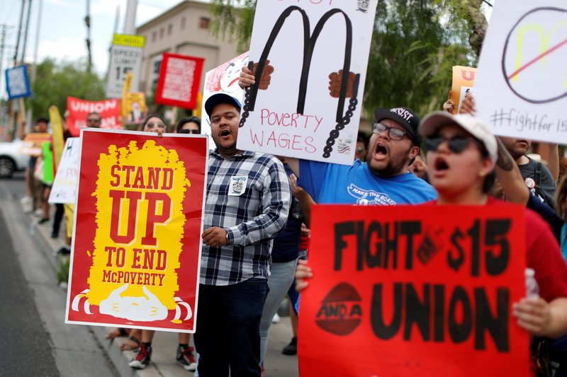 Striking McDonald's workers in Las Vegas demand a $15 minimum wage June 14, 2019. The Economic Policy Institute estimates that about 42% of the U.S. workforce will be covered by $15 minimum wage laws by 2026. (CNS photo/Mike Segar, Reuters)
