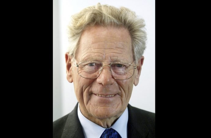 In this Oct. 6, 2004 file photo, Hans Küng, attends the Book Fair in Frankfurt, Germany. Hans Küng, the Roman Catholic theologian who was an early colleague and friend of the future Pope Benedict XVI but later fell foul of the Vatican for challenging church doctrine and became a vocal critic of the pontiff, has died. He was 93. Küng died Tuesday April 6, 2021, at his home in Tuebingen, according to the Global Ethic Foundation, or Stiftung Weltethos in German, which he established in 1995. (Michael Probst/AP via Crux)